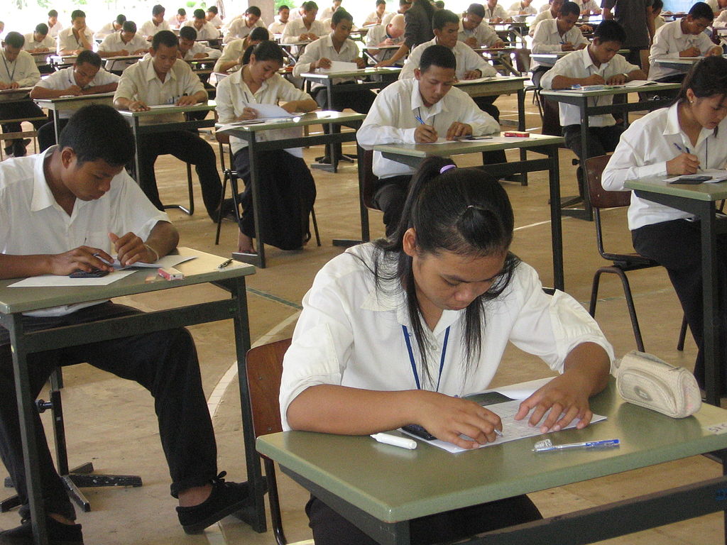 School students taking an exam in Cambodia